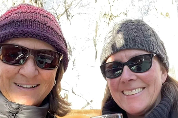 News leaders from KSJD (Four Corners  Community Radio) and KSUT (Tribal Radio) wearing warm hats and sunglasses while outdoors